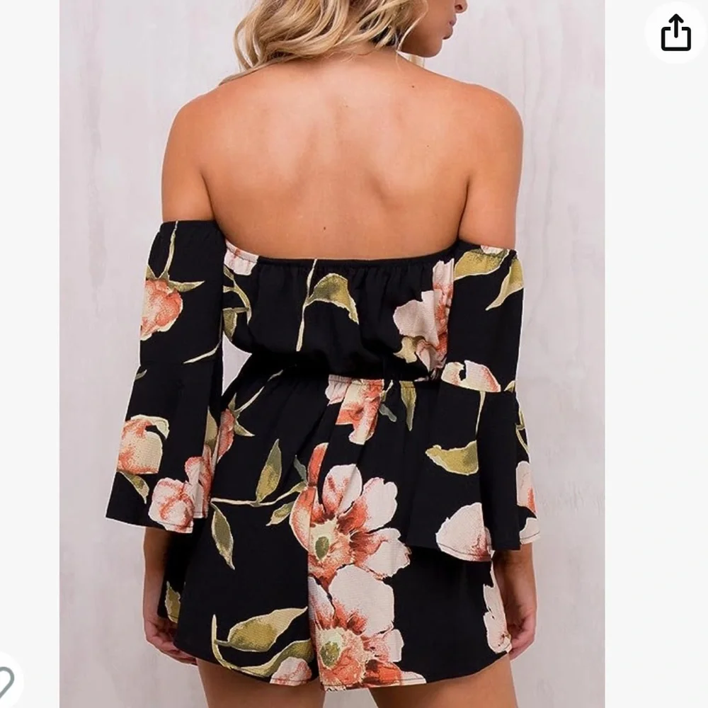 NWOT. Black flowy floral off the shoulder 3/4 sleeve romper. - Picture 5 of 11